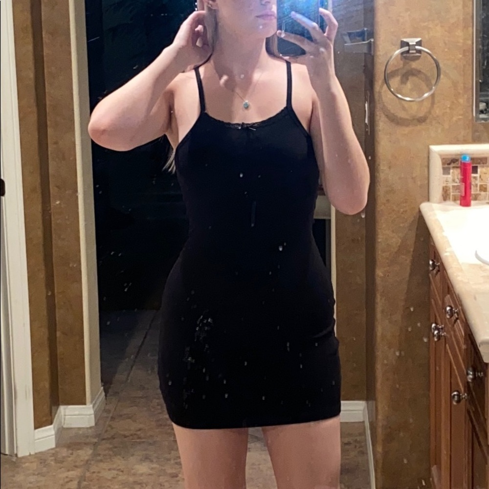 Brandy Melville black dress with lace trim on neck